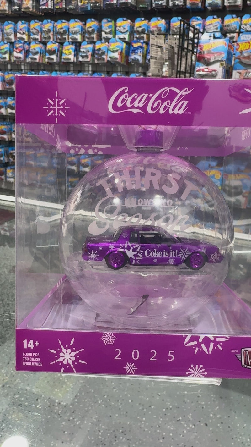 Load and play video in Gallery viewer, 2025 M2 Machines Christmas Ornament &quot;CHASE&quot; Coca Cola 1987 Buick Grand National
