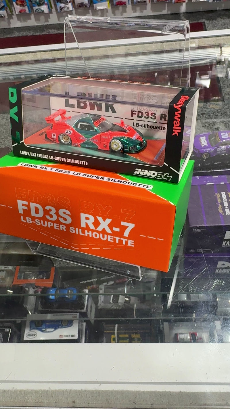 Load and play video in Gallery viewer, Inno64 LBWK Mazda RX7 FD3S Super Silhouette Liberty Walk Malaysia EXPO &quot;CHASE&quot;
